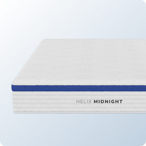 Helix Midnight mattress topper on a light blue background