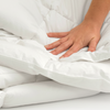 A closeup of the Helix Duvet Insert showing its plush cozy fill 