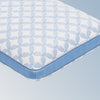 An image of the GlacioTex Cooling Pillow on a light blue gradient background