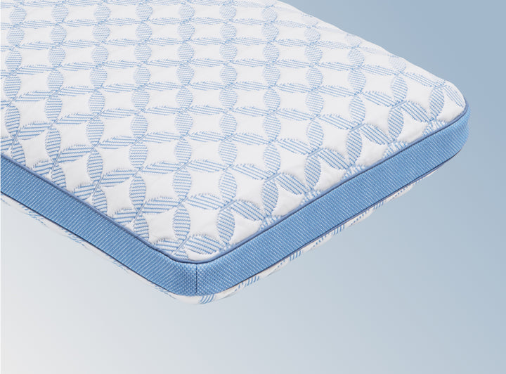 An image of the GlacioTex Cooling Pillow on a light blue gradient background