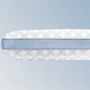 An image of the GlacioTex Cooling Pillow on a light blue gradient background
