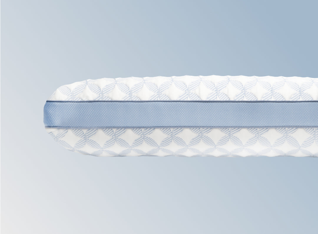 An image of the GlacioTex Cooling Pillow on a light blue gradient background