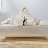 The Birch Duvet Insert on a Birch mattress in a bedroom scene