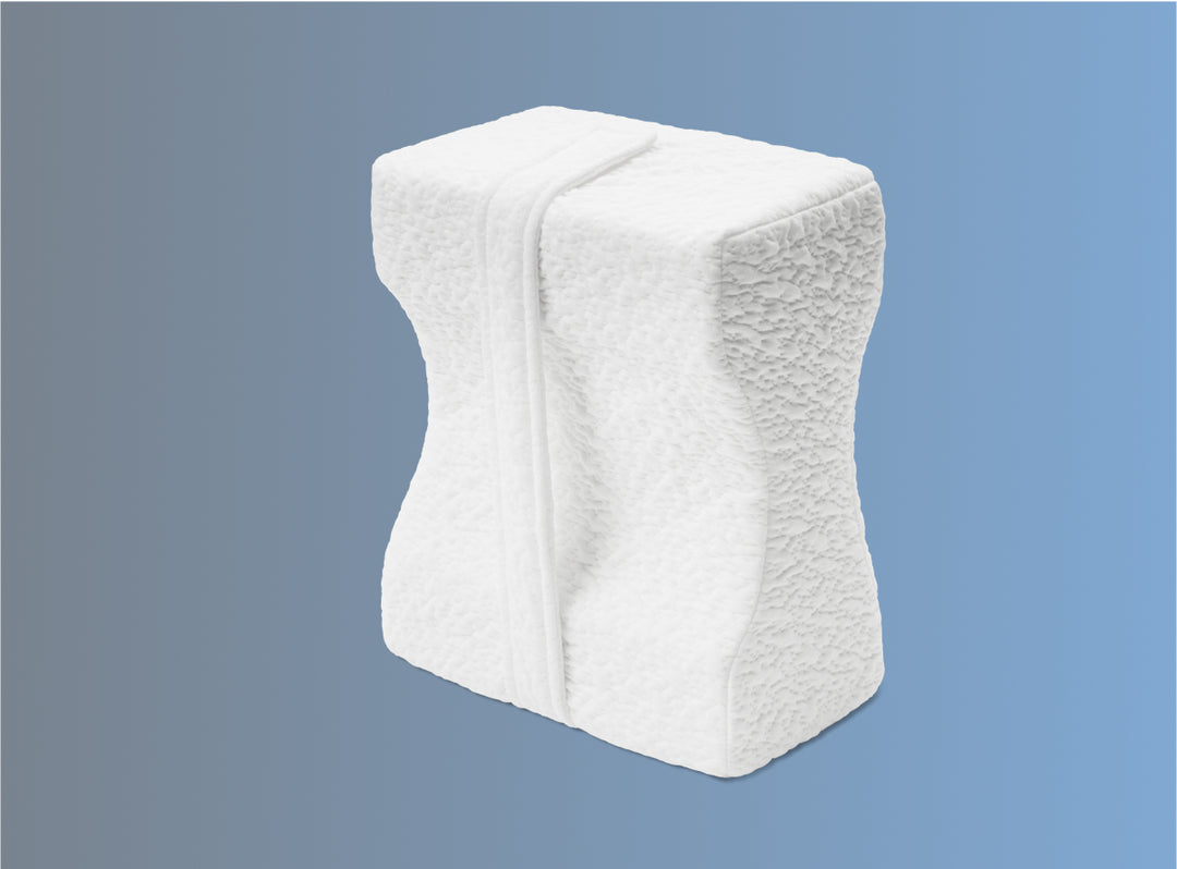 The Helix Knee Pillow on a blue background