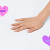 A closeup of the Kids Waterproof Mattress Encasement with a hand feeling the surface