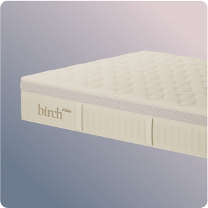 Mattress with 'birth' branding on a light gray background