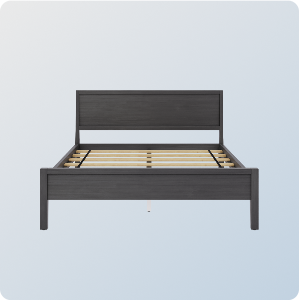 A dark gray bed frame on a blue gradient background