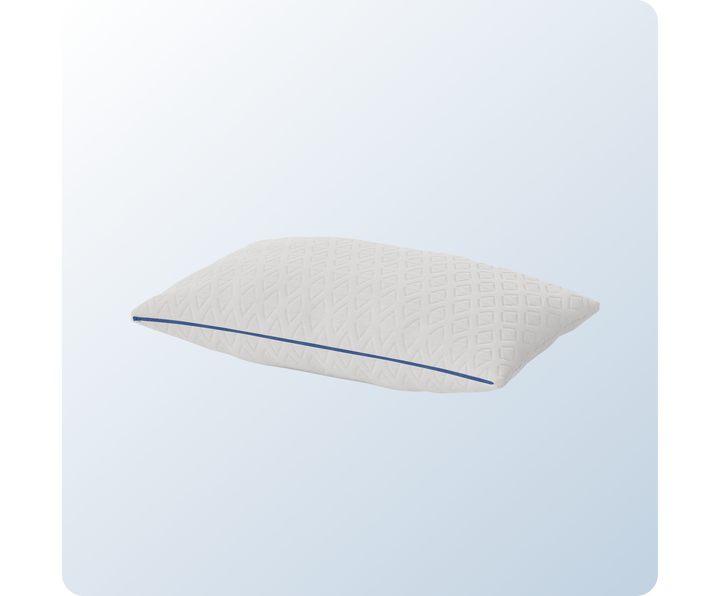 A product image of the ComfortAdjust Cooling Pillow showing it zipped with a low loft. 