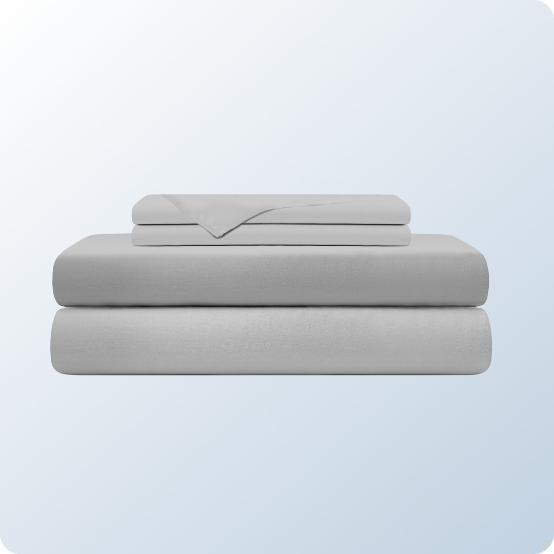 An image of the Cotton Blend Sheet Set on a blue background gradient